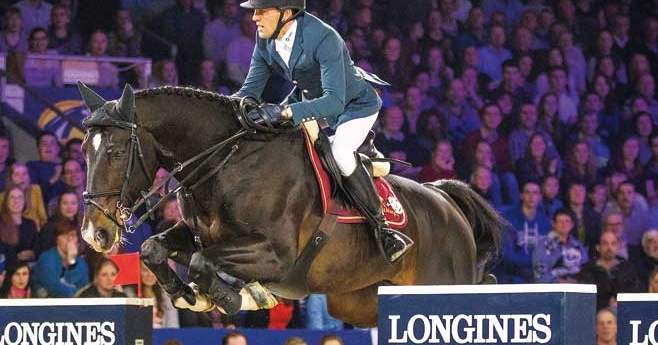 Simon Delestre et Qlassic Bois Margot, vainqueurs à l’étape Coupe du Monde de Mechelen, fin décembre 2014